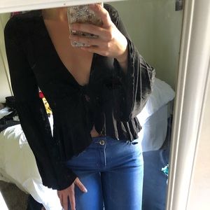 Black jersey knit bell sleeve shirt